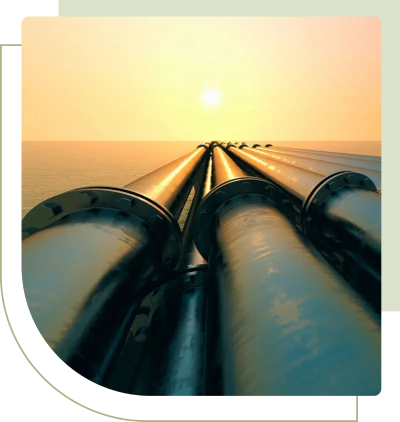 A close up of the side of two pipes.